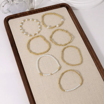 7pc Pearl & Gold Adjustable Bracelet Stack