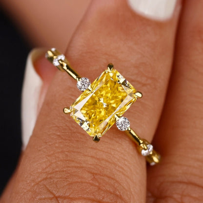 Minimal Zircon Accented Baguette Center Ring