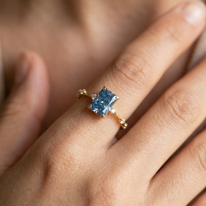 Minimal Zircon Accented Baguette Center Ring